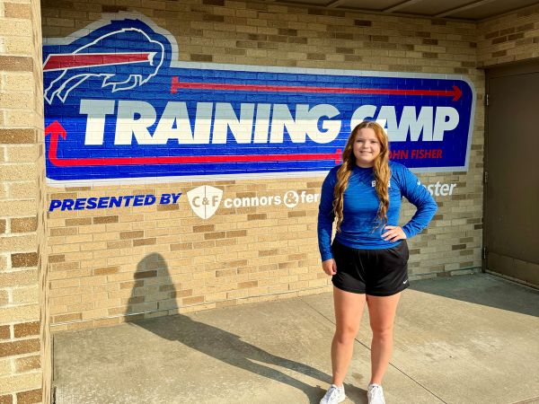 UM student Audrey Missildine stands outside the training facility for the NFL Buffalo Bills