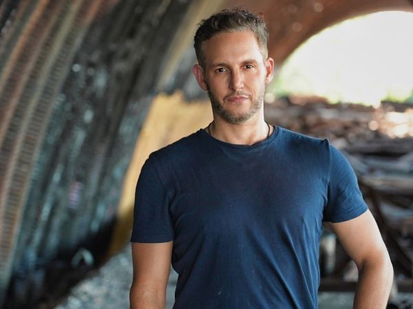 Jason Bellini head photo with blue background