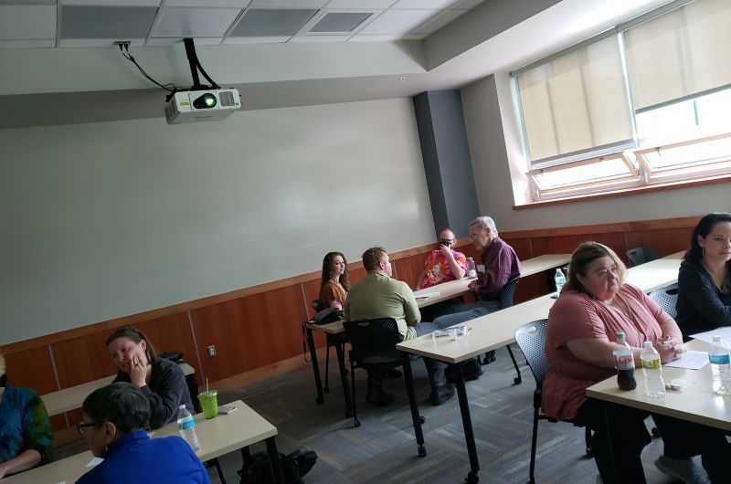 Small group engaging in conversation