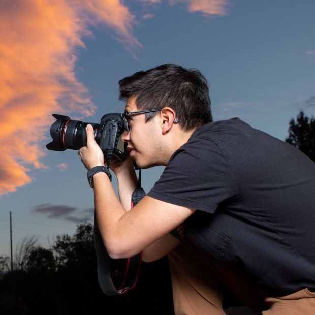 Photojournalist taking photo