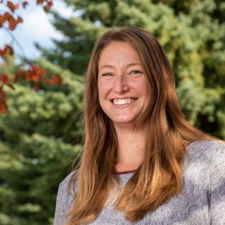 Image of Leah smiling, she's your outdoor adventure admissions counselor