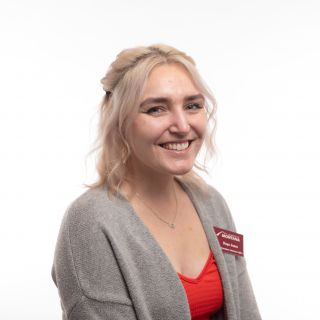 Image of Hope smiling like a helpful boss