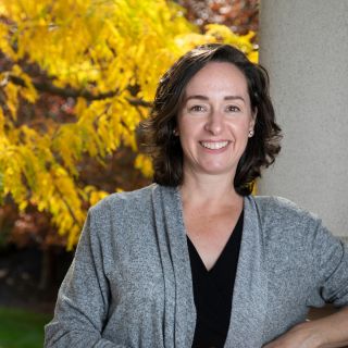 Image of Brigitta smiling ready to help you make Missoula your next adventure