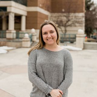 Image of Chanelle smiling because she's ready to help plan your visit