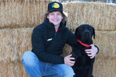Photo of Brady Barnhill with his dog