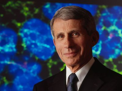 A picture of Anthony Fauci with arms crossed