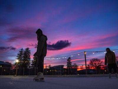 UM students skate at sunset on the Oval.