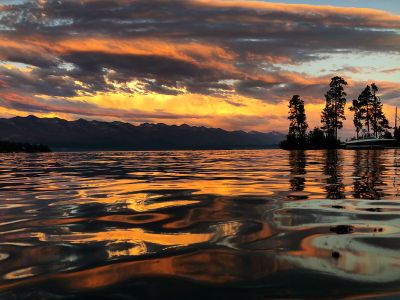 A sunset photo of Flathead Lake.