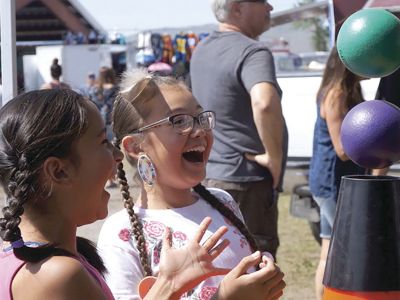 Photo of two girls at science fair