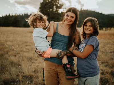 UM alumna and Missoula resident Stephanie Land poses for a picture here with her two children. 