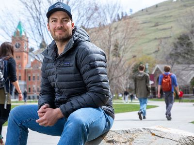 A picture of Kyle Brekke on the Oval before Main Hall.