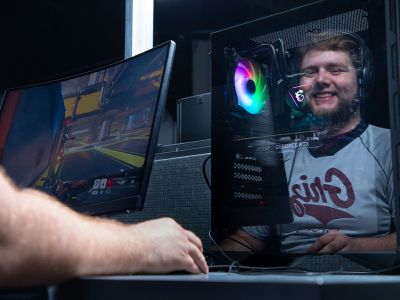 A picture of Jimmy Painter plays a video game. 