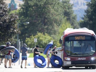 A photo of floaters getting on UM's free Clark Fork River Recreation Shuttle.