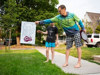Missoulians place Griz yard sign in the ground