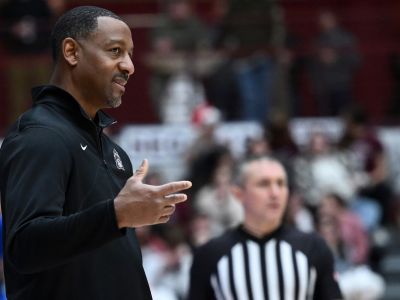 A photo of Griz men's basketball coach Travis DeCuire