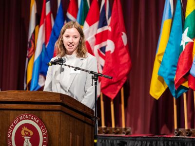 UM student Clara Bentler speaks at a podium at UM.