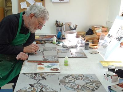 Photo of artist in his studi0
