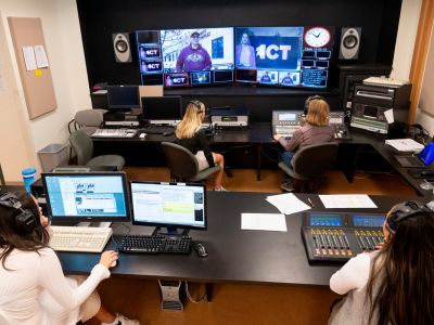 Students participate in an ICT News broadcast