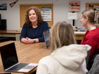 Psychology Professor Anisa Goforth (left) works with students in UM’s Specialist in School Psychology Program this fall. 
