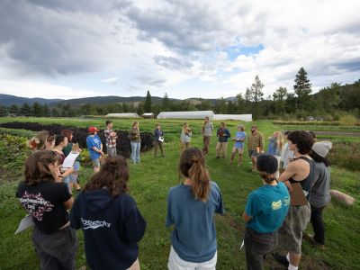 Students gather at the UM PEAS Farm during new student orientation