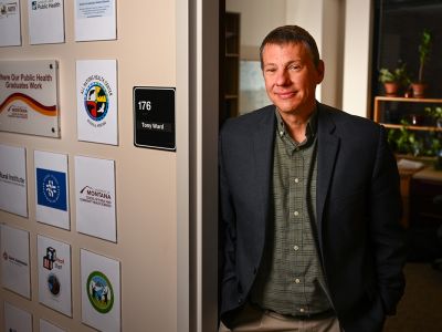 A picture of Tony Ward standing at the door to his UM office.