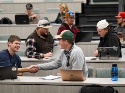 UM students act as buyers and sellers in a professional sales course.