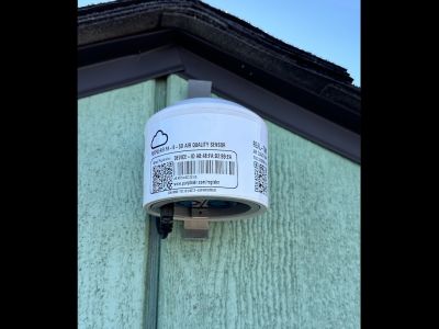 Air quality sensor attached to a structure