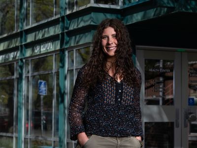 A picture of Taylor Sadewic outside the Curry Health Center.