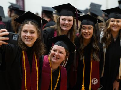 UM students pose for a group selfie.