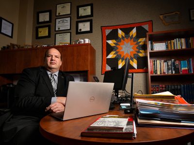 A picture of Kekek Stark in his UM law office.