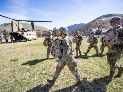 UM ROTC students load a Chinook Helicopter on campus
