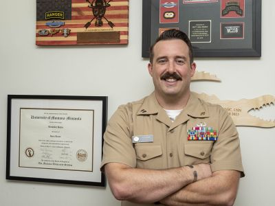 A picture of JAG Alex Butler in his office.