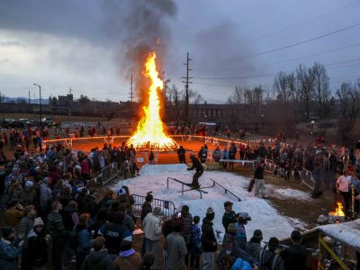 Hundreds of Winter Pep Rally attendees watched the bonfire and riders on the rails at the River Bowl on February 14, 2026. (UM Photo by Marley Barboeisel)
