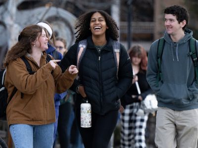 Students walk on campus between classes.