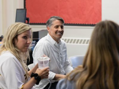 Joseph Crider smiles while leading a classroom of students at the 51�Թ���'s Phyllis J. Washington College of Education.