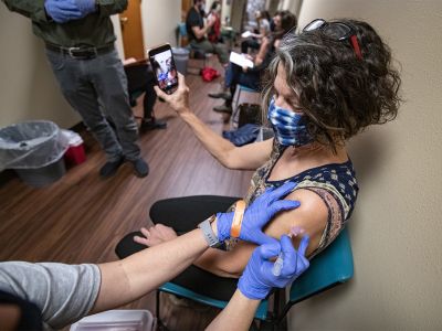 A UM employee recieves the COVID vaccine.