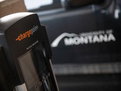 An electric car charger on campus 