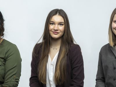 Three UM female rising seniors. There are three portraits in a row.