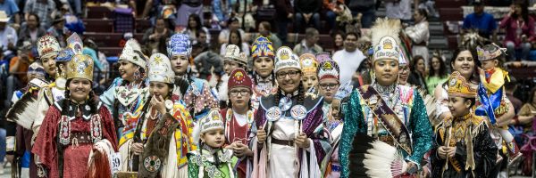 group of women in traditional Native American clothing