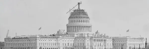 Black and white photo view of U.S. Capitol under construction, Washington D.C., circa 1860-1861.