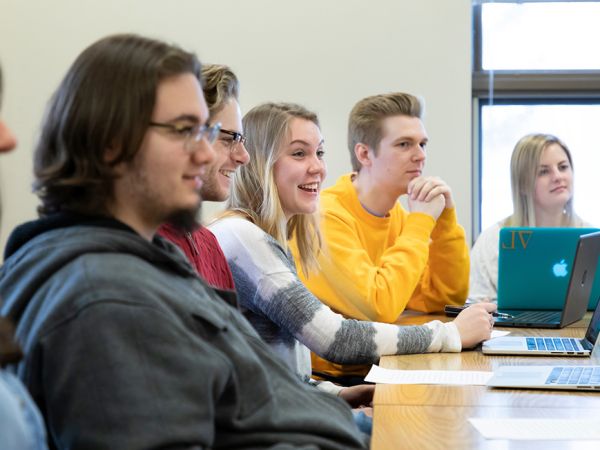 Students take part in a lively discussion in a Creative Writing class.
