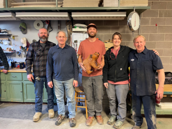 Electric Shop employees with Roving Grizzly Award.