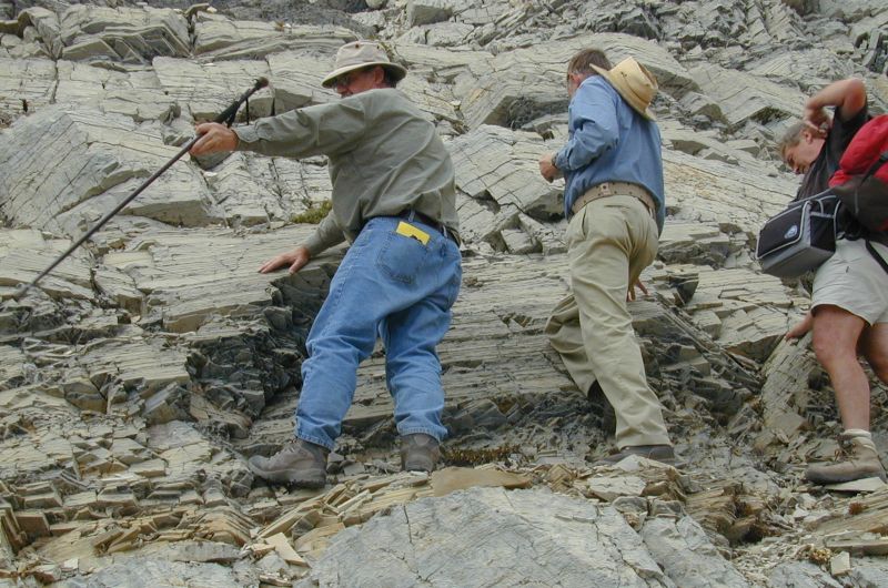 don and two others on the side of a rock face