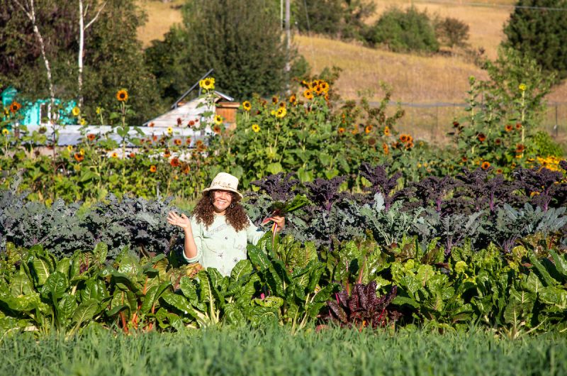 Girl in Peas vegetable garden