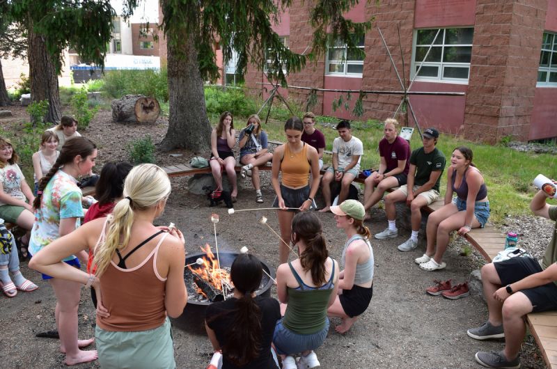 Schwanke participants making smores on UM campus.