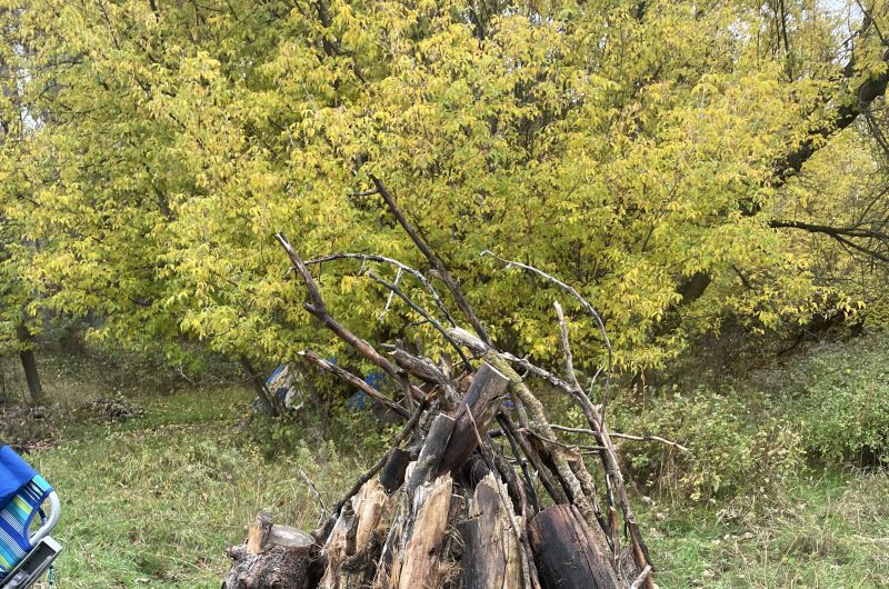 sweat lodge firewood and rock pile